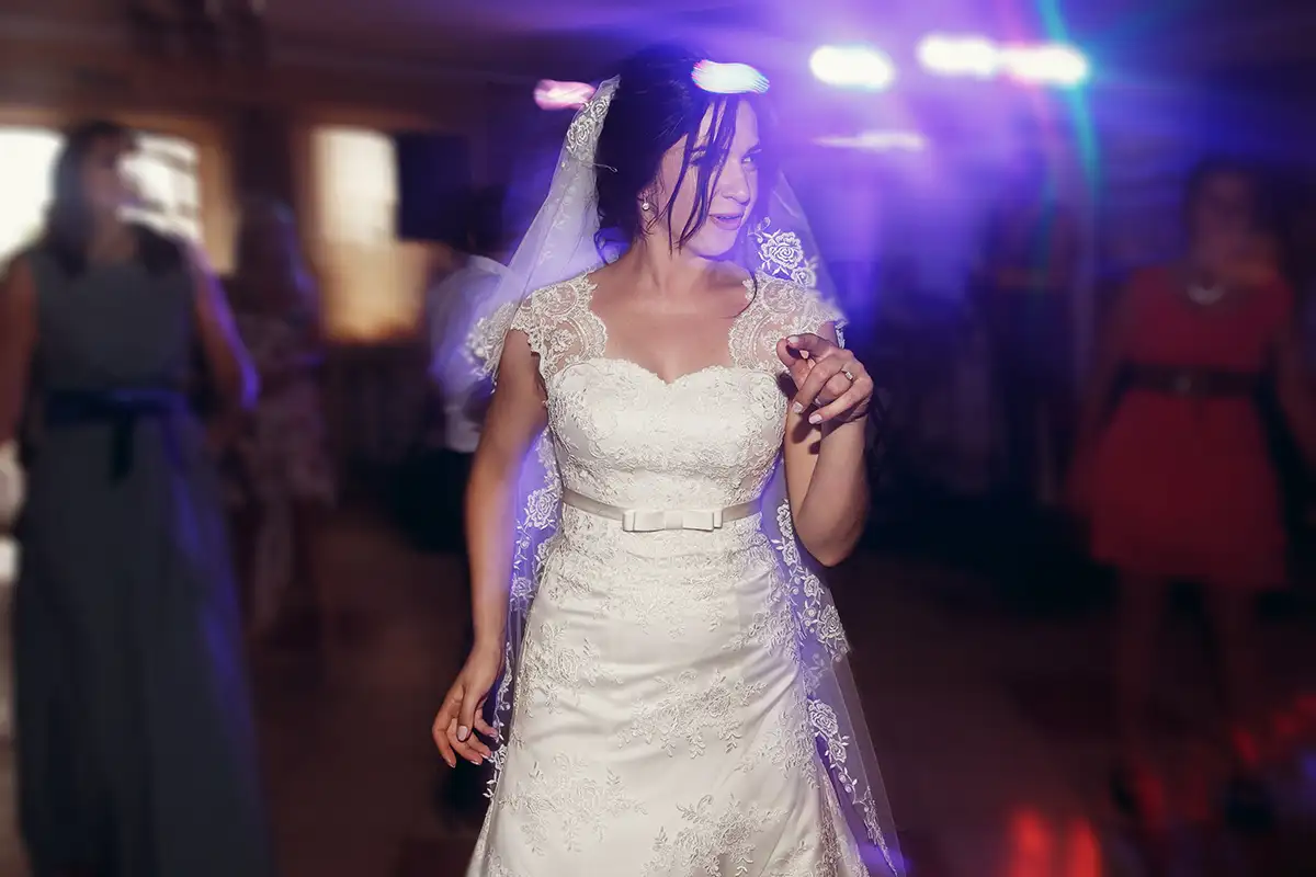 Happy couple dancing at their wedding reception